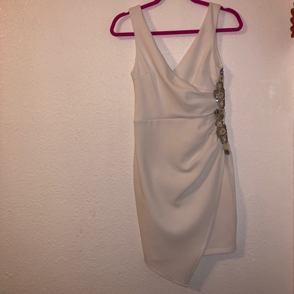 White bodycon dress.